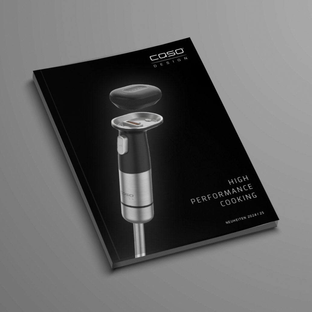 Schwarzes Kochbuch mit einem Küchengerät, Caso Design, High Performance Cooking