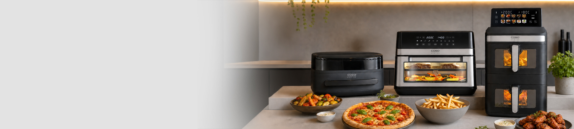 Multiple air fryers with food like pizza, fries, and chicken wings.