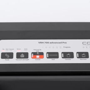 Vacuum sealer with buttons for food, vacuum strength, cancel, seal, canister, and marinate options.