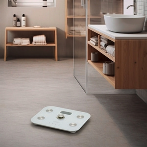 Bathroom with scale, sink, and wooden shelves. Modern interior design.