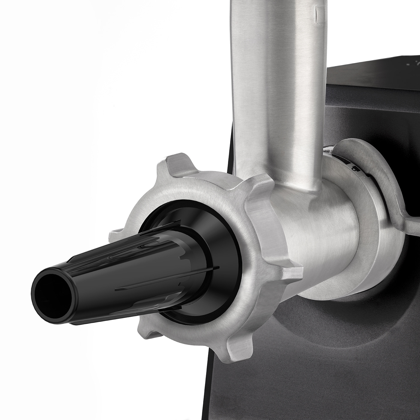 Close-up of a meat grinder with black outlet and silver parts