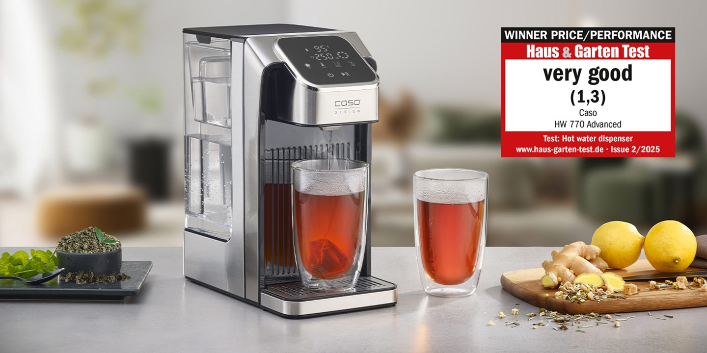 Hot water dispenser with 'very good' rating and accessories like tea and lemon.