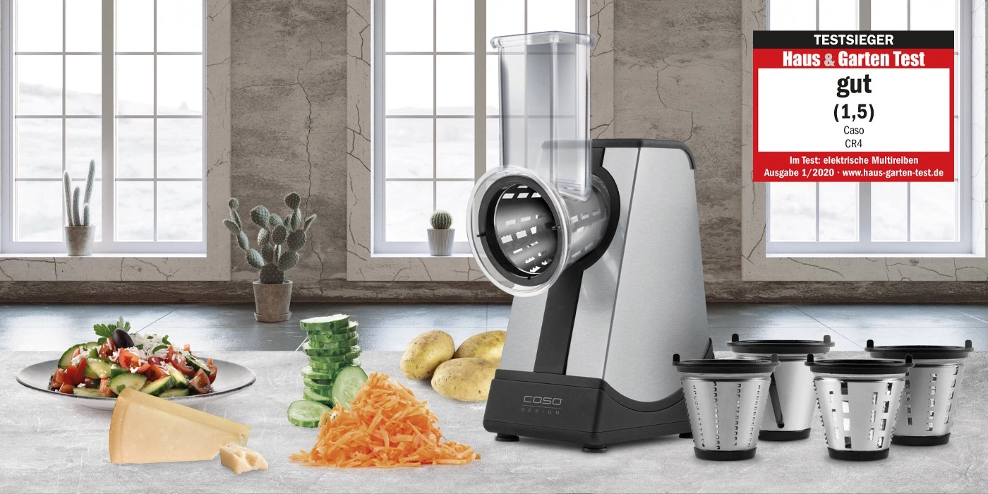 Electric kitchen grater with vegetables and cheese, test result 'good' (1.5) from Haus & Garten Test.