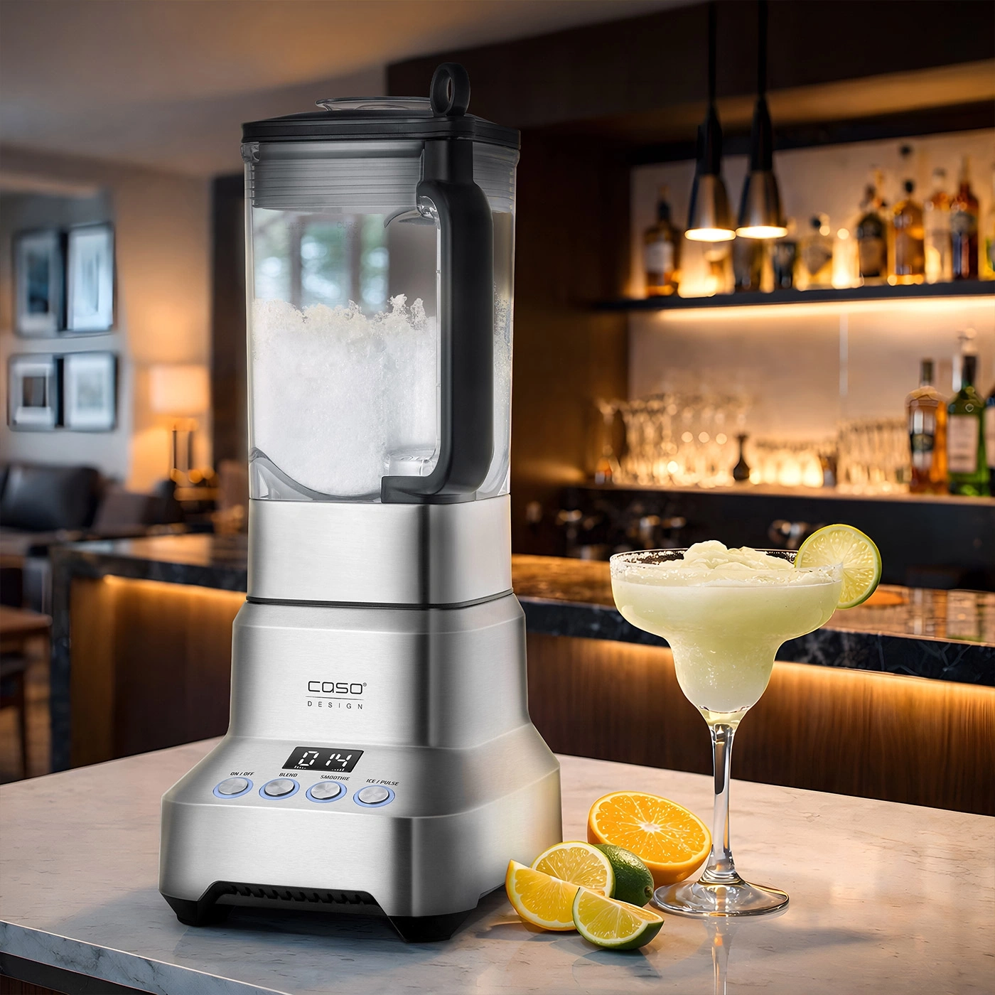 Stainless steel blender with frozen drink and fruits on a counter.