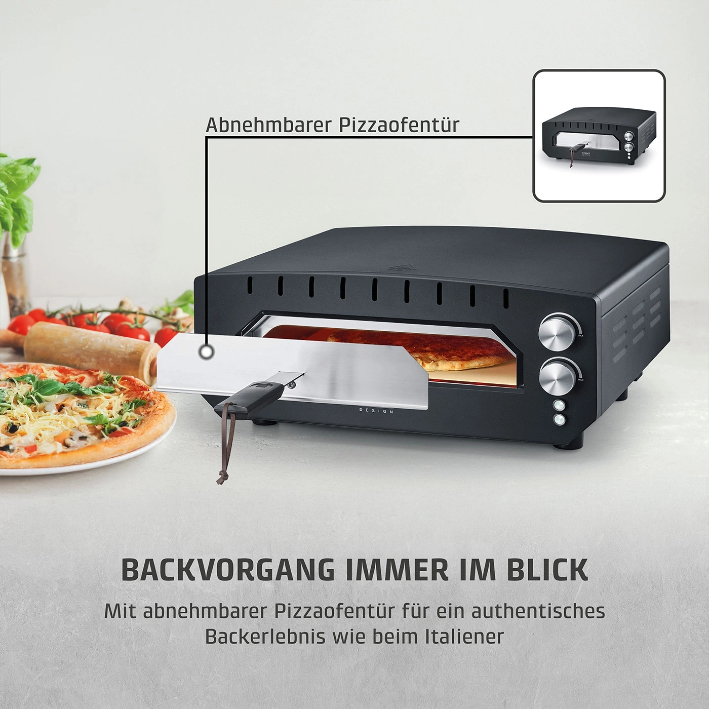 Ein Pizzaofen mit abnehmbarer Tür und einer Pizza daneben.