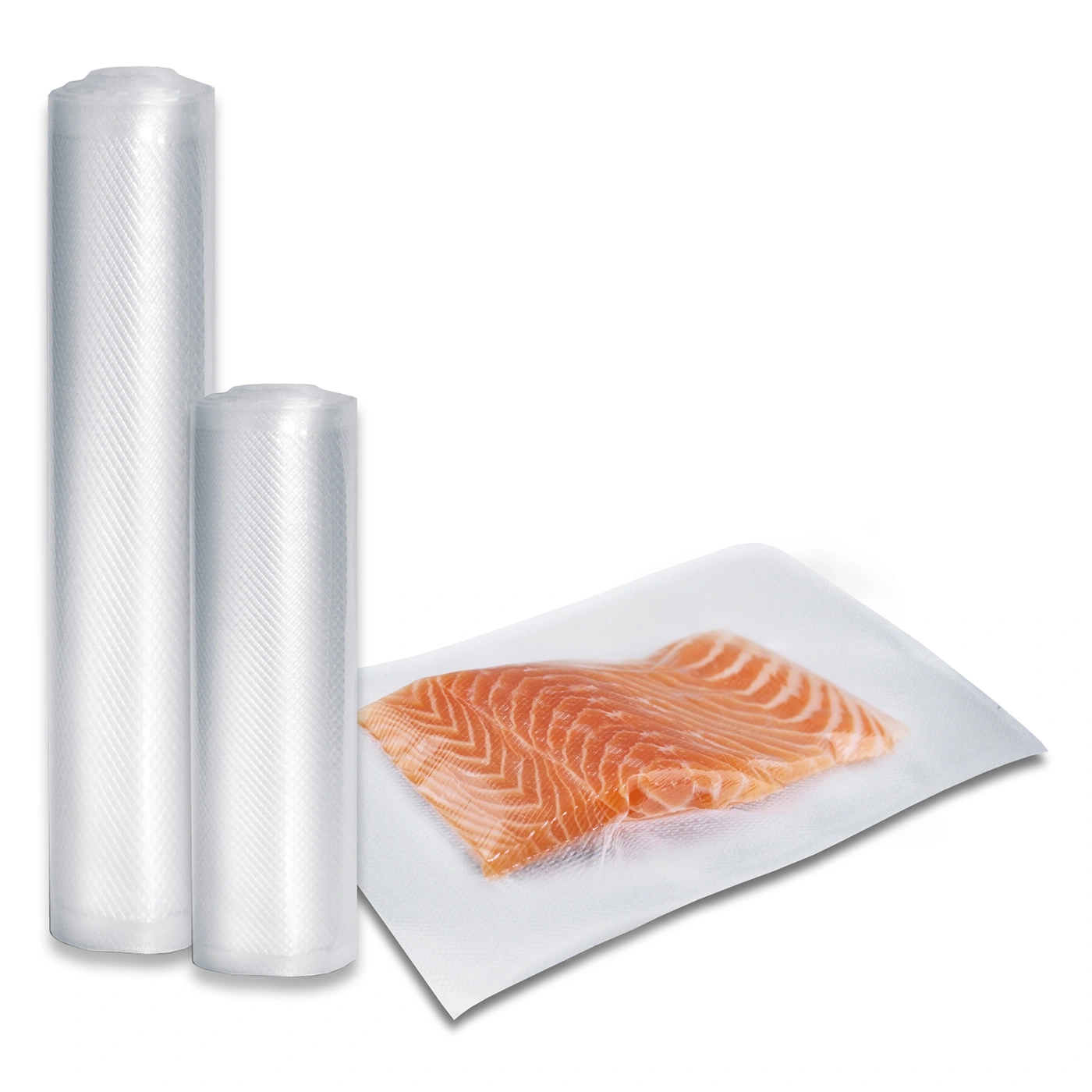 Rolls of vacuum bags and salmon fillet packed in foil, isolated on white background