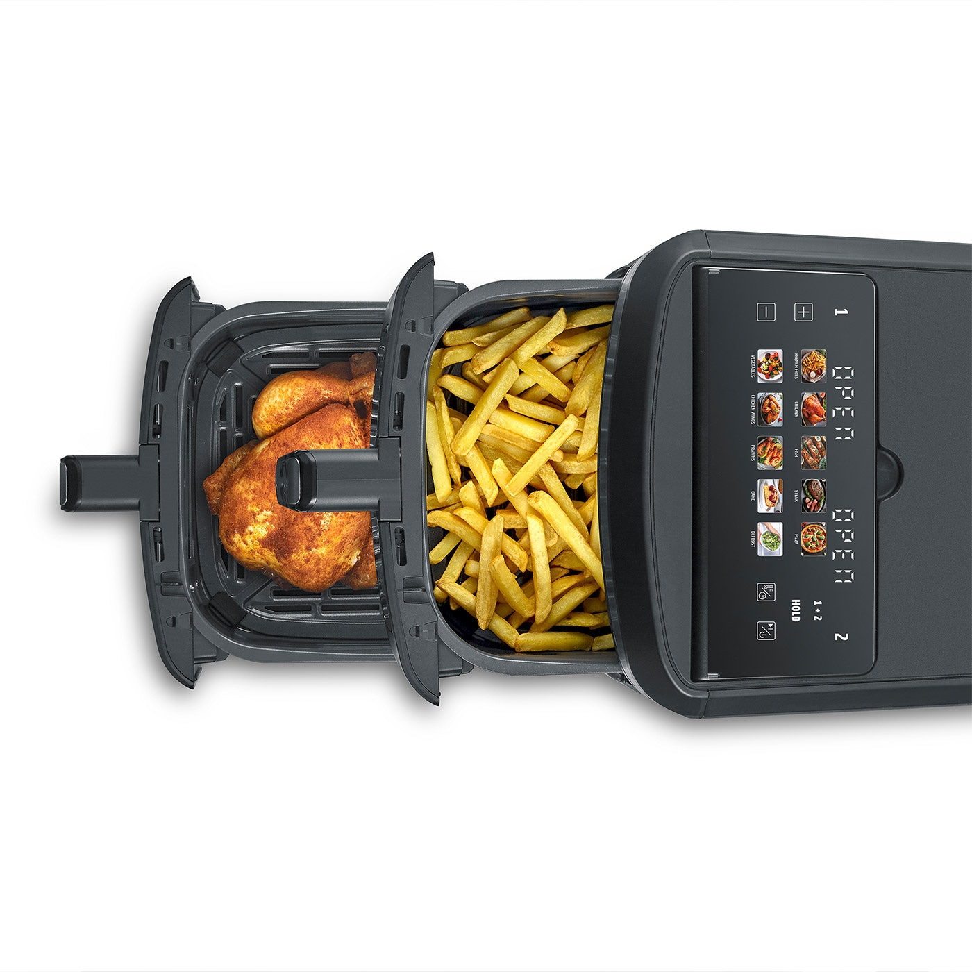 Chicken pieces and fries in an air fryer