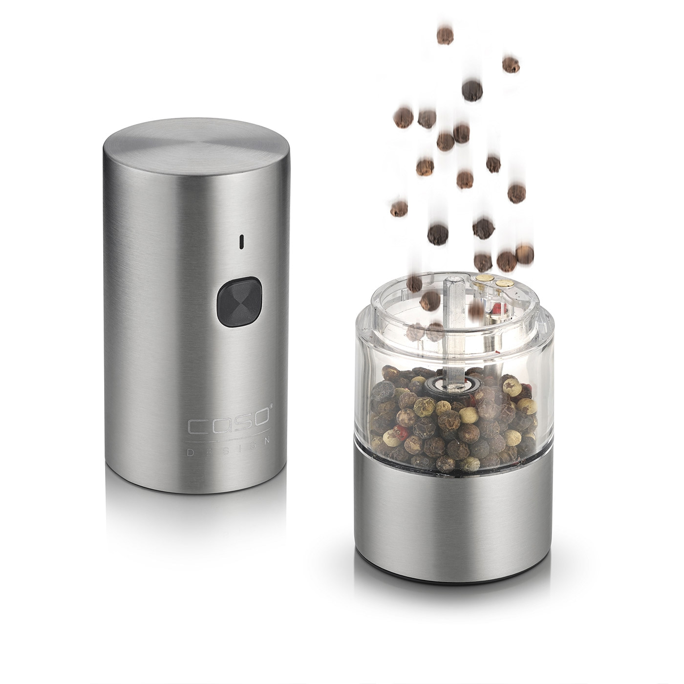 Electric pepper grinder with peppercorns falling into it, set against a white background.