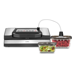 Vacuum sealer with containers, berries, salad, kitchen, food preservation