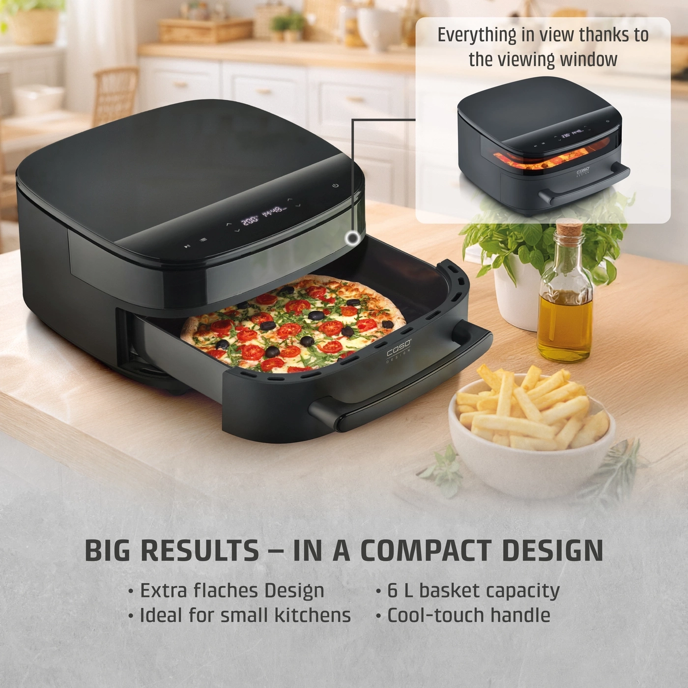 A modern black air fryer with a pizza being prepared inside.