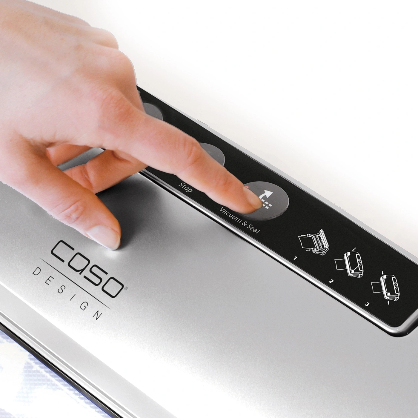 Hand presses vacuum & seal button on silver device with logo design