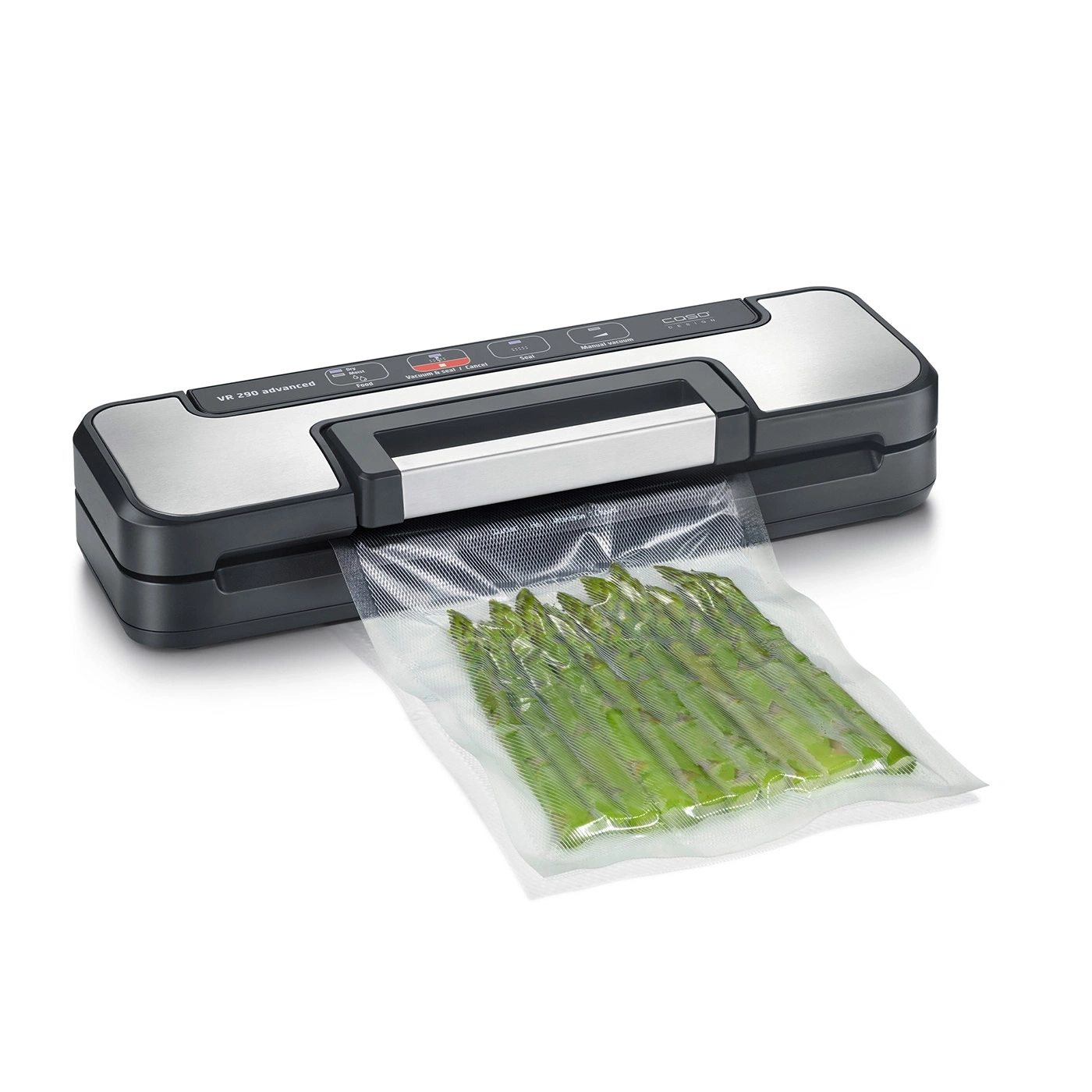 Vacuum sealer machine sealing green asparagus tips in a plastic bag on a white background.