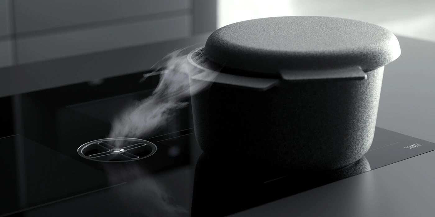 Steam rises from a pot on an induction cooktop.
