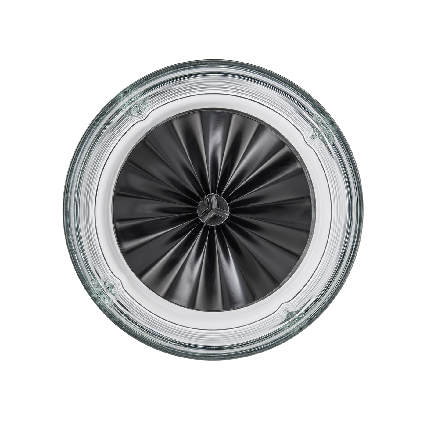 Top-down view of a glass with a black, ridged bottom and a transparent rim.