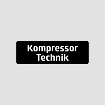 Ein schwarzes Schild mit dem Text Kompressor Technik auf grauem Hintergrund.