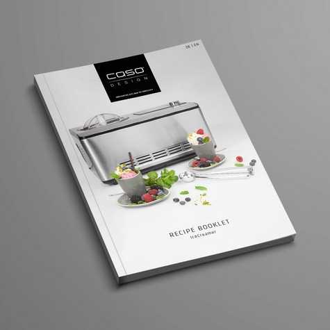 Ice cream recipe booklet with ice cream machine and ice cream cups with berries