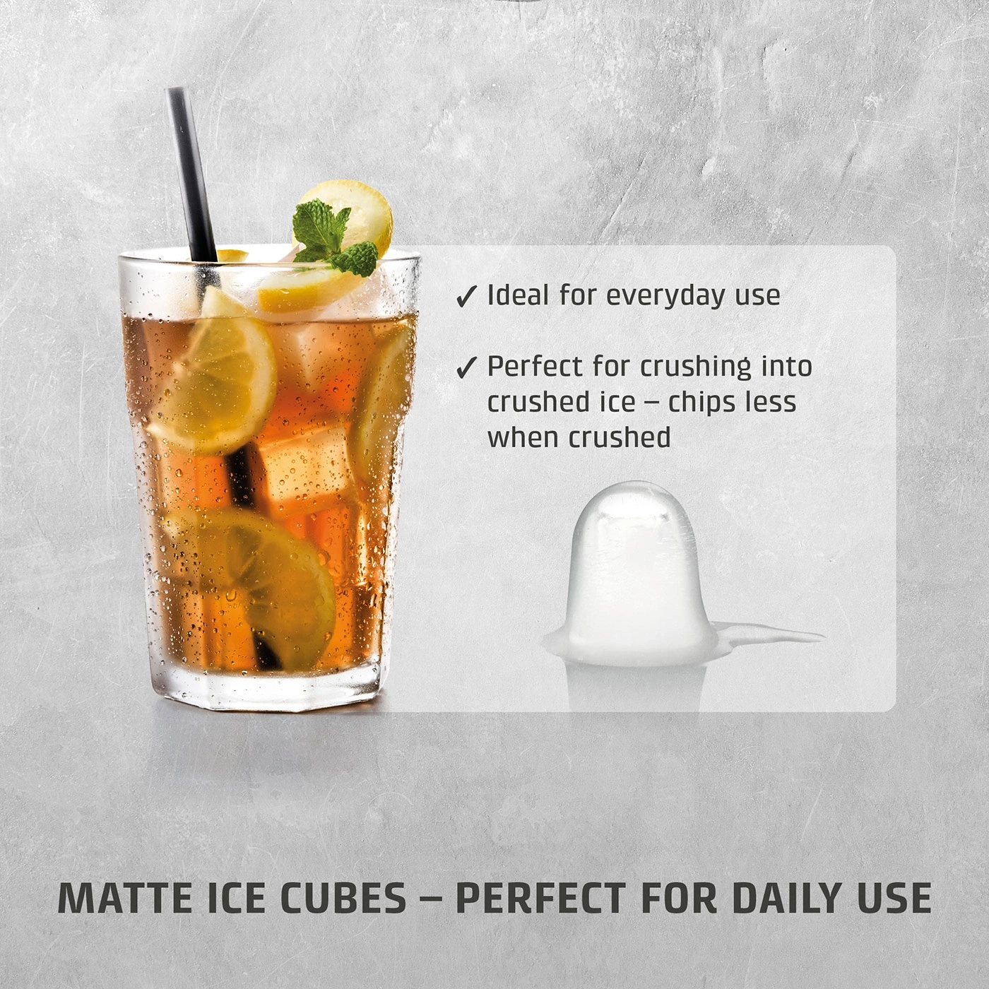 A glass of iced tea with lemon and mint, next to an ice cube.