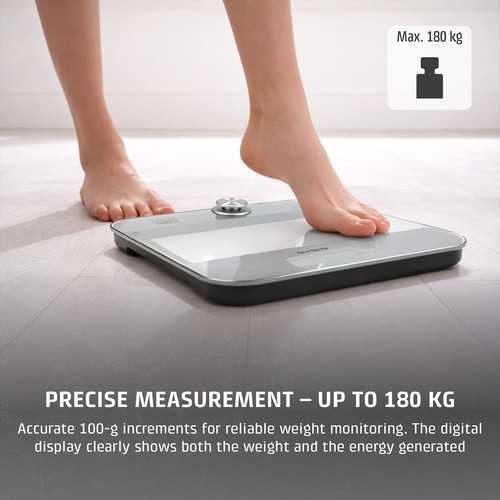 A person steps onto a scale with the text Max. 180 kg.