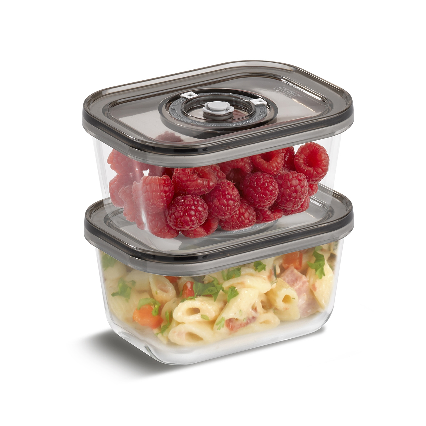 Two transparent containers stacked, filled with raspberries and pasta.