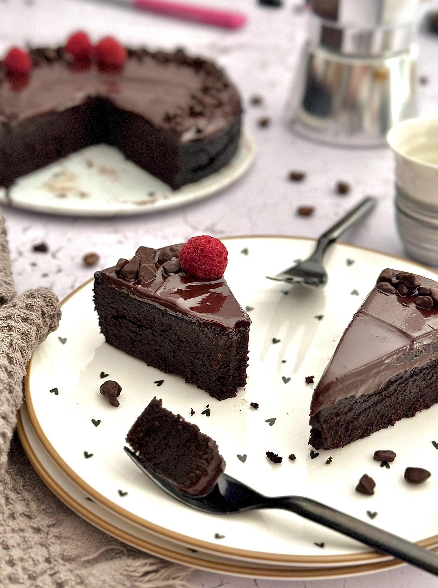 Chocolate cake with raspberries on a plate, delicious and tasty dessert