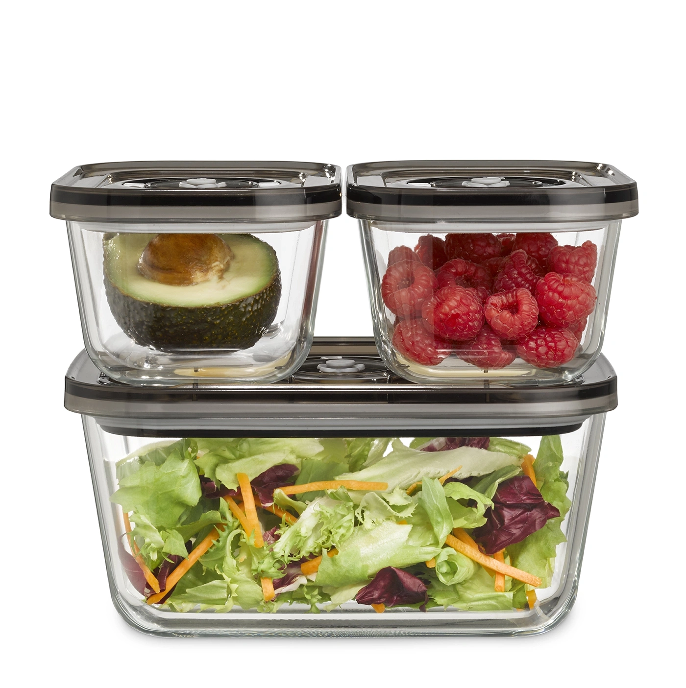 Drei Glasbehälter mit Avocado, Himbeeren und Salat, isoliert auf weißem Hintergrund.