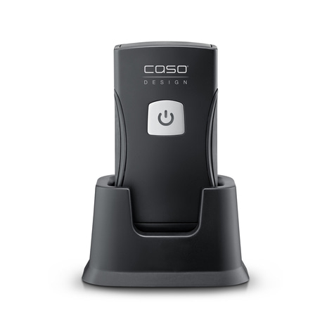 Black device with charging station. Caso Design. Power button.