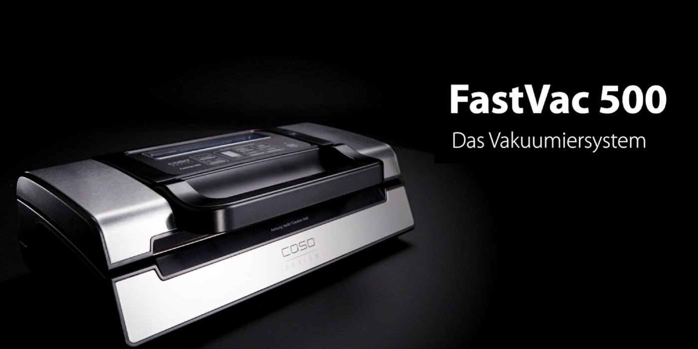 FastVac 500 Vakuumiersystem, ein schwarzes Gerät mit silbernen Akzenten, auf schwarzem Hintergrund