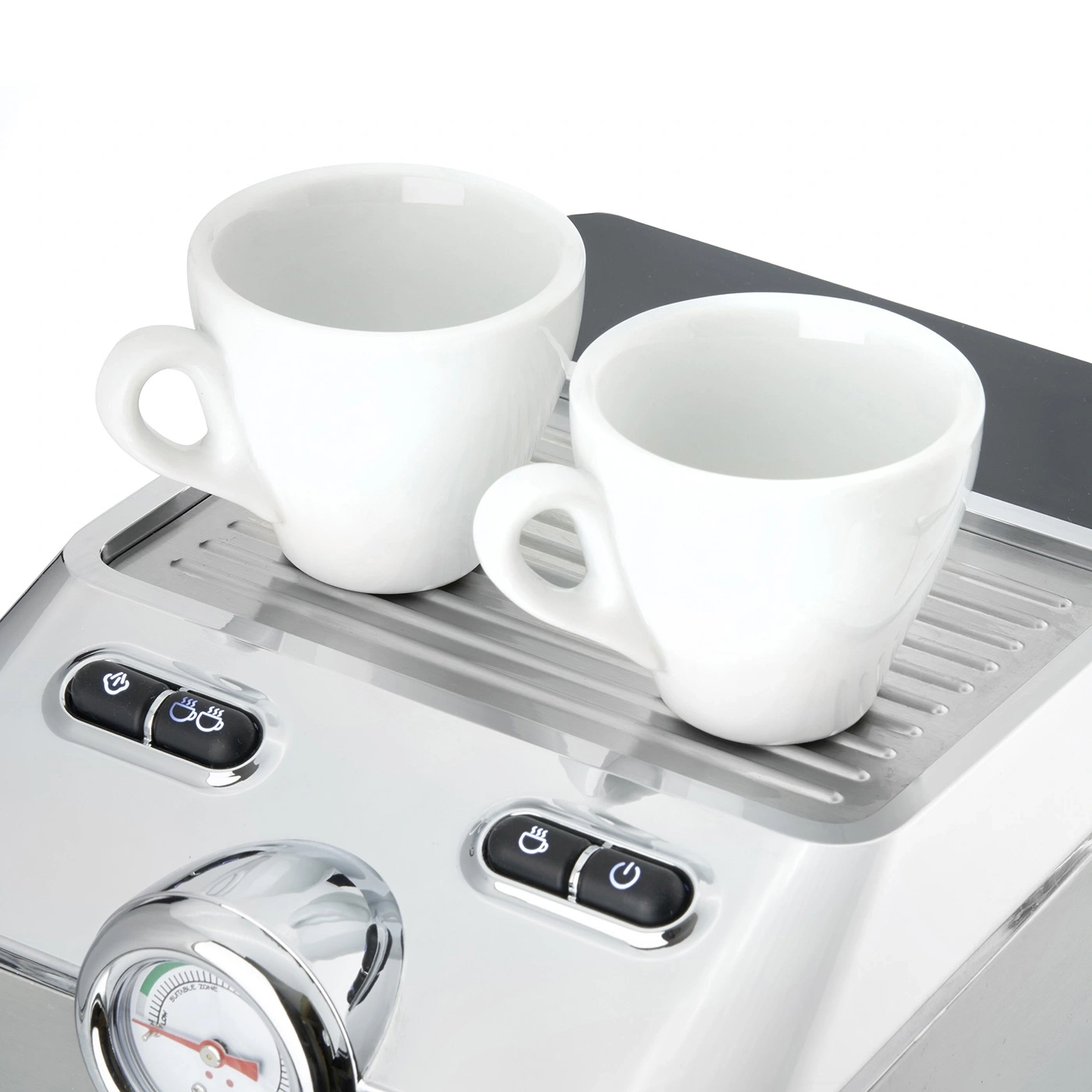 Two white cups on an espresso machine with buttons and a gauge, close-up.