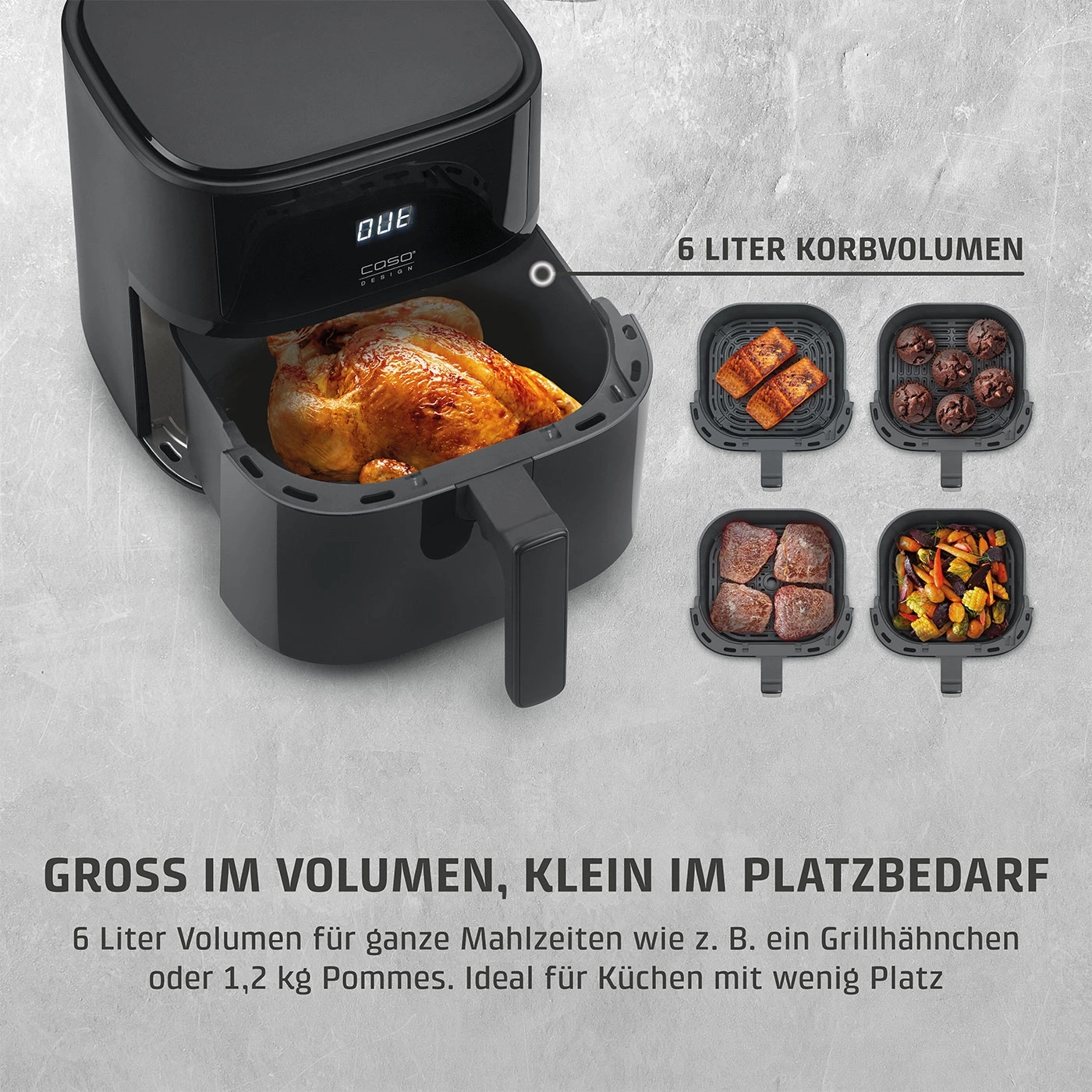 Eine schwarze Heißluftfritteuse mit einem ganzen Brathähnchen und vier Körben mit Lebensmitteln.