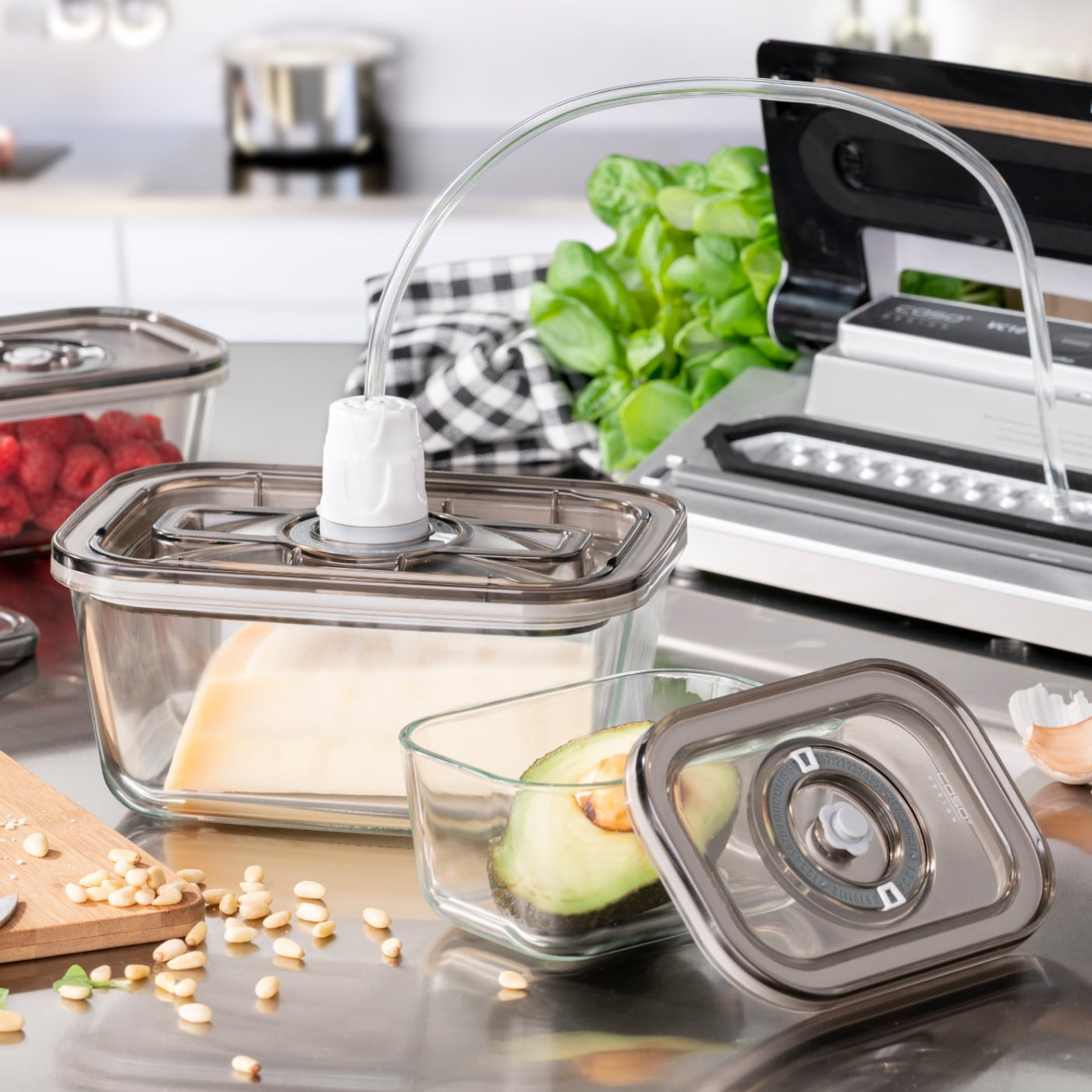 Vacuum sealer with containers and food, kitchen, stainless steel