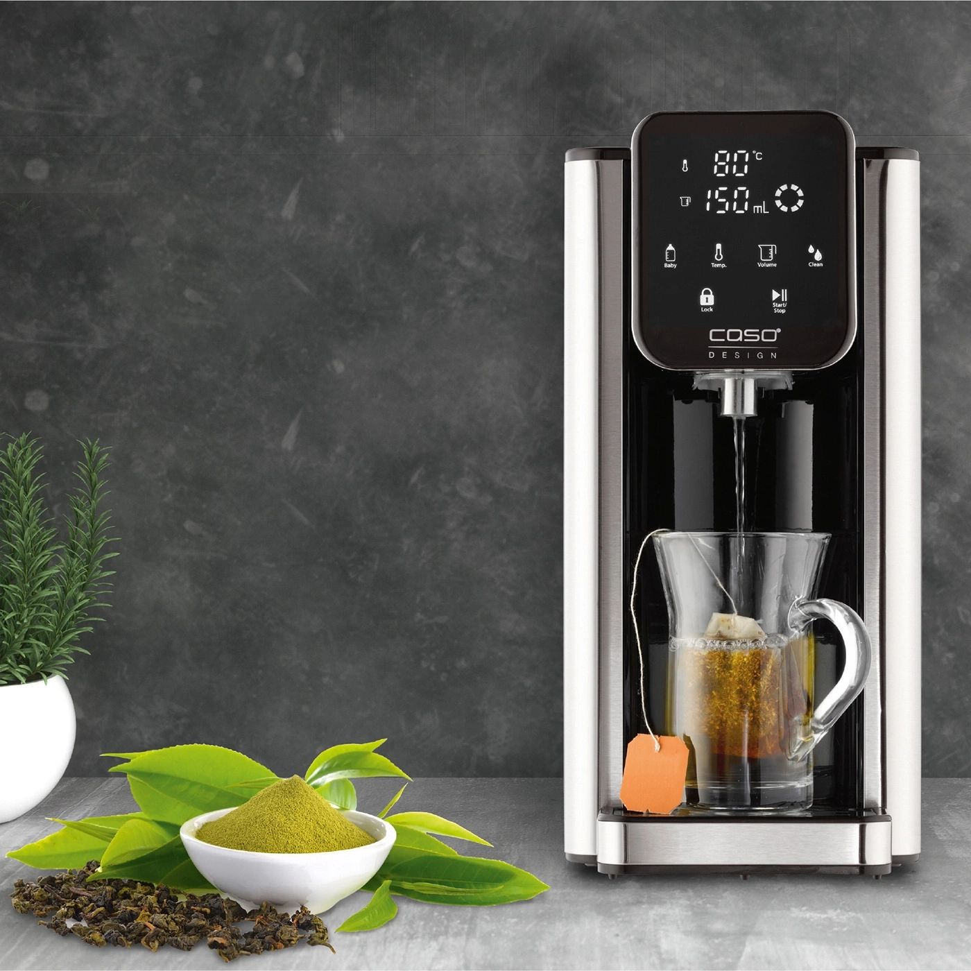 Tea machine with teabag and ingredients, ready for a cup of tea.