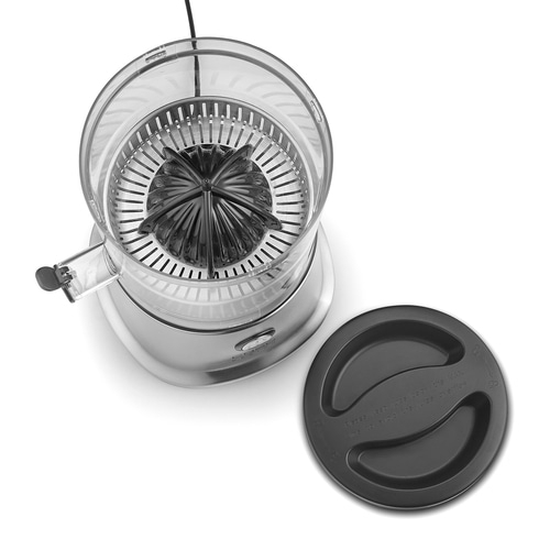 Ein elektrischer Zitruspresse mit transparentem Behälter und schwarzem Deckel.