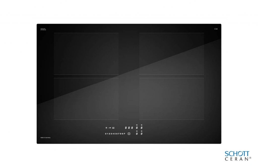 Black ceramic glass hob with four cooking zones and digital controls, made in Germany.