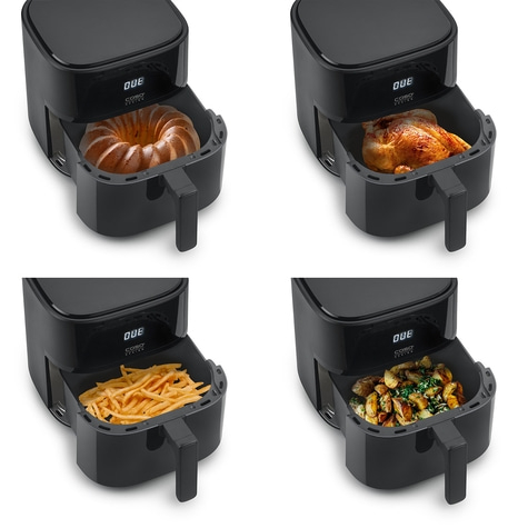Air fryer with cake, chicken, fries, and vegetables. Black appliance.