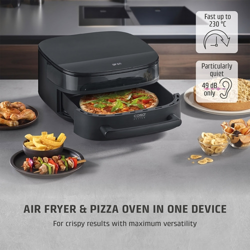 A black air fryer and pizza oven with pizza, chicken, fries, and cake.
