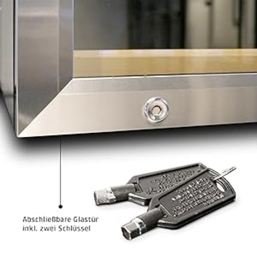 Lockable glass door with two keys, close-up of the lock detail.