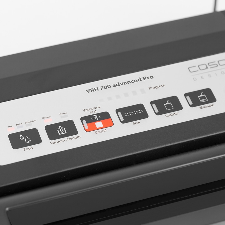 Vacuum sealer with buttons for various functions, including vacuum, seal, and marinate options.