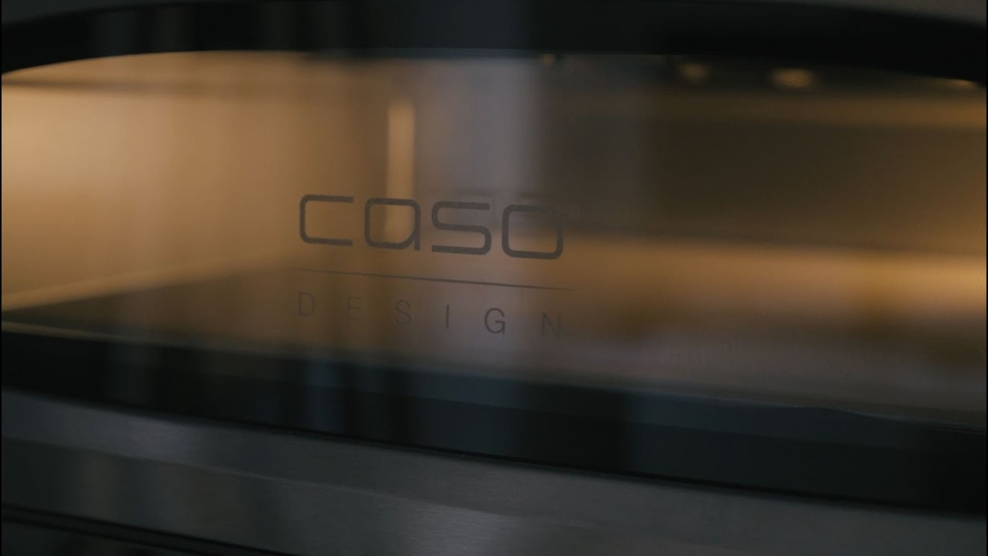 Nahaufnahme eines Ofens mit dem Logo 'CASO DESIGN' auf der Glasfront.