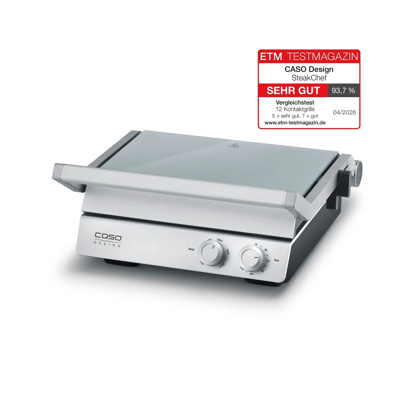 A silver contact grill with a glass lid and an ETM Testmagazine seal.