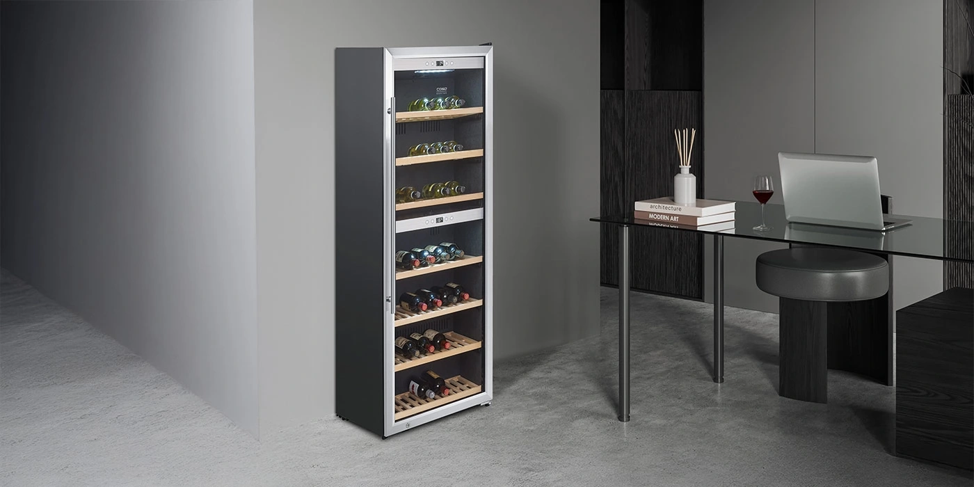A modern wine cooler filled with bottles in a stylish room.