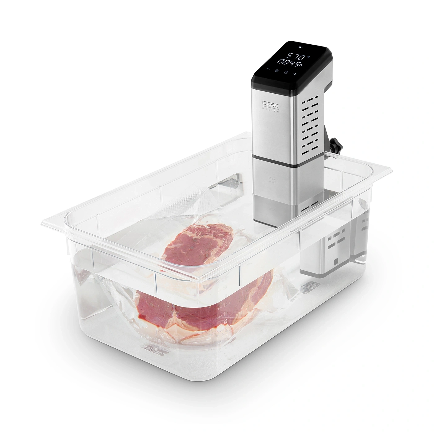 Sous vide machine with meat in water bath, ready for cooking.