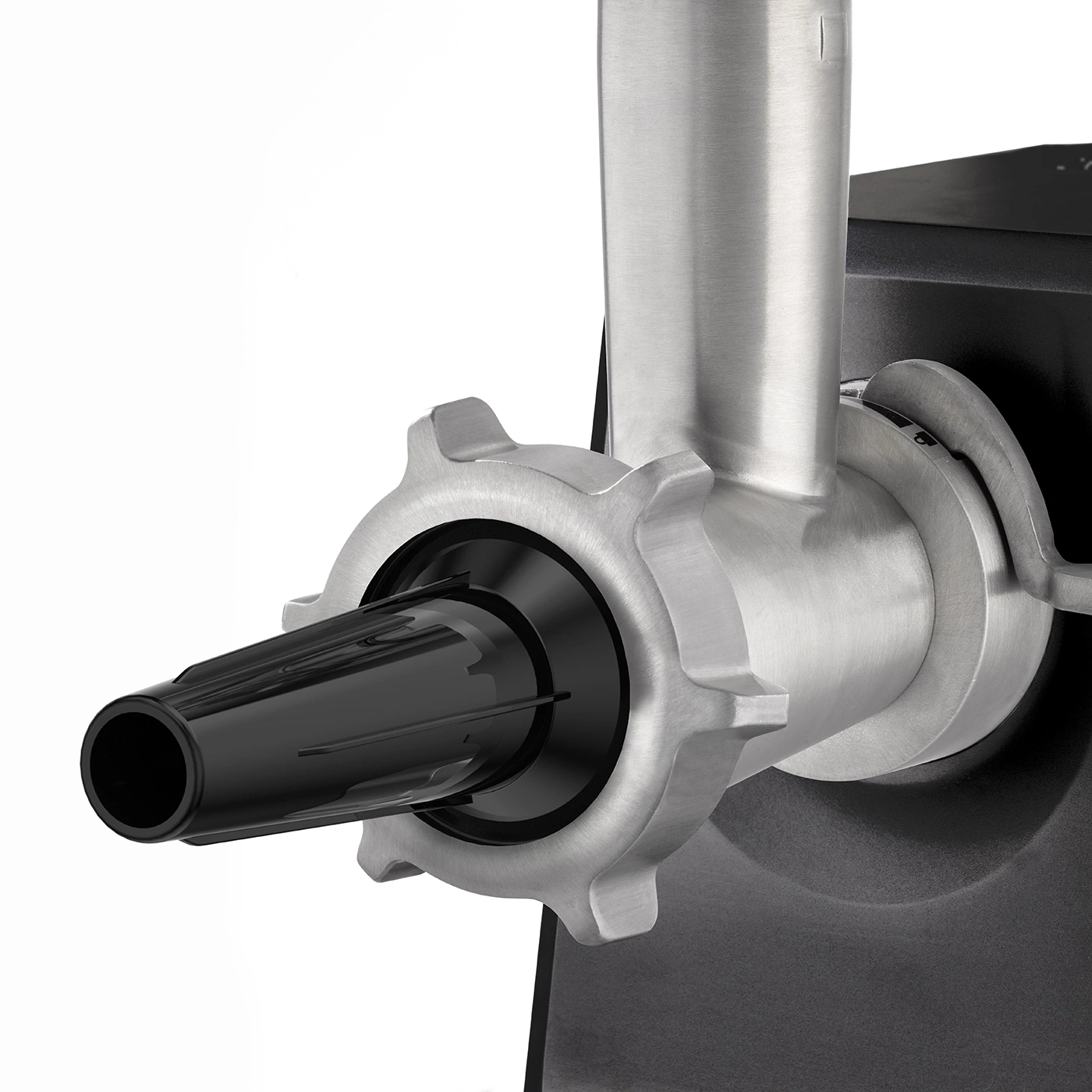 Close-up of a meat grinder with black outlet and silver parts