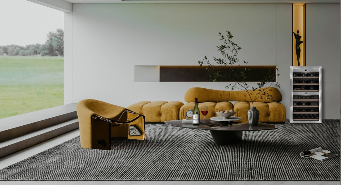 Yellow sofa, chair, wine cooler, rug, table, wine, vase, window, art, living room