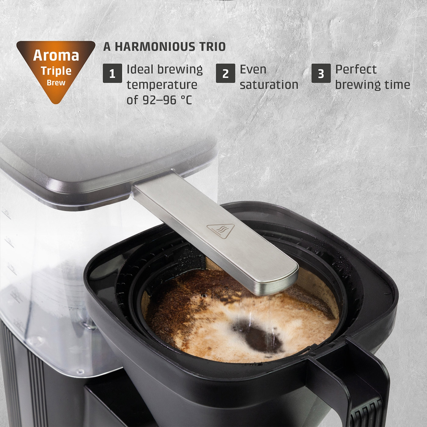 Coffee maker with "Aroma Triple Brew" and "Harmonious Trio"