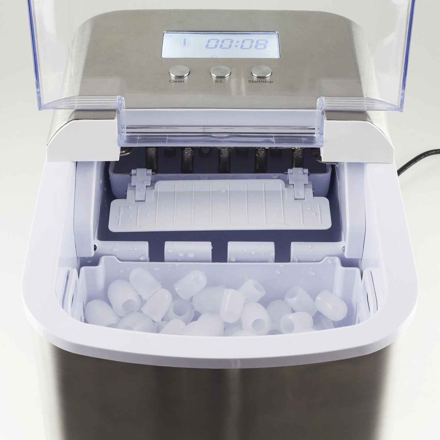 Ice maker with ice cubes, digital display, and control buttons.