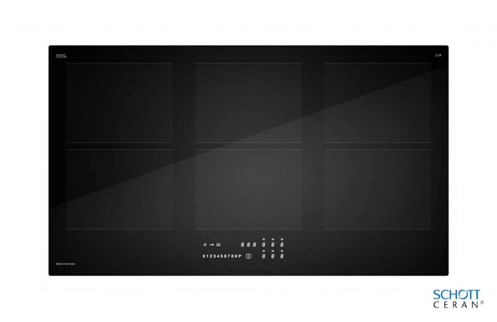 A black induction cooktop with three cooking zones and digital controls.