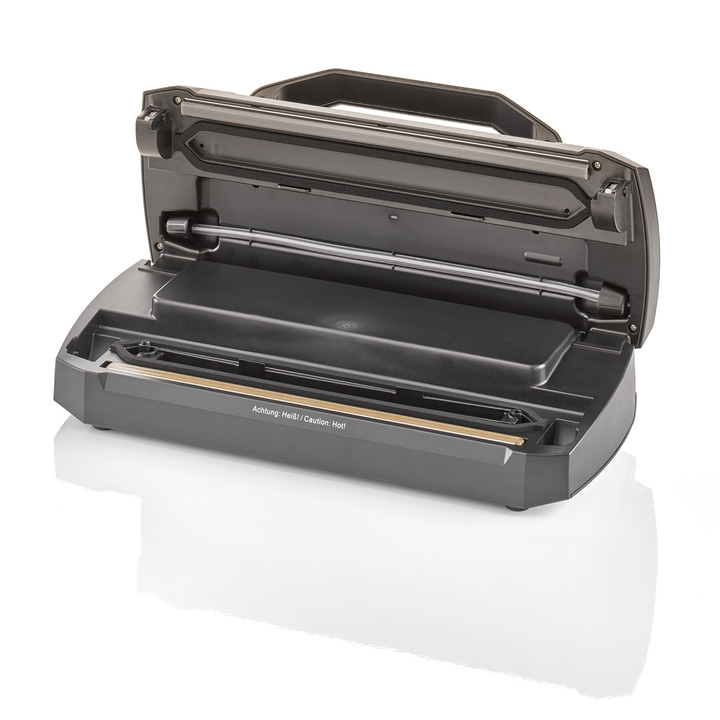 Vacuum sealer, open, with warning: Caution: Hot! / Achtung: Heiß!