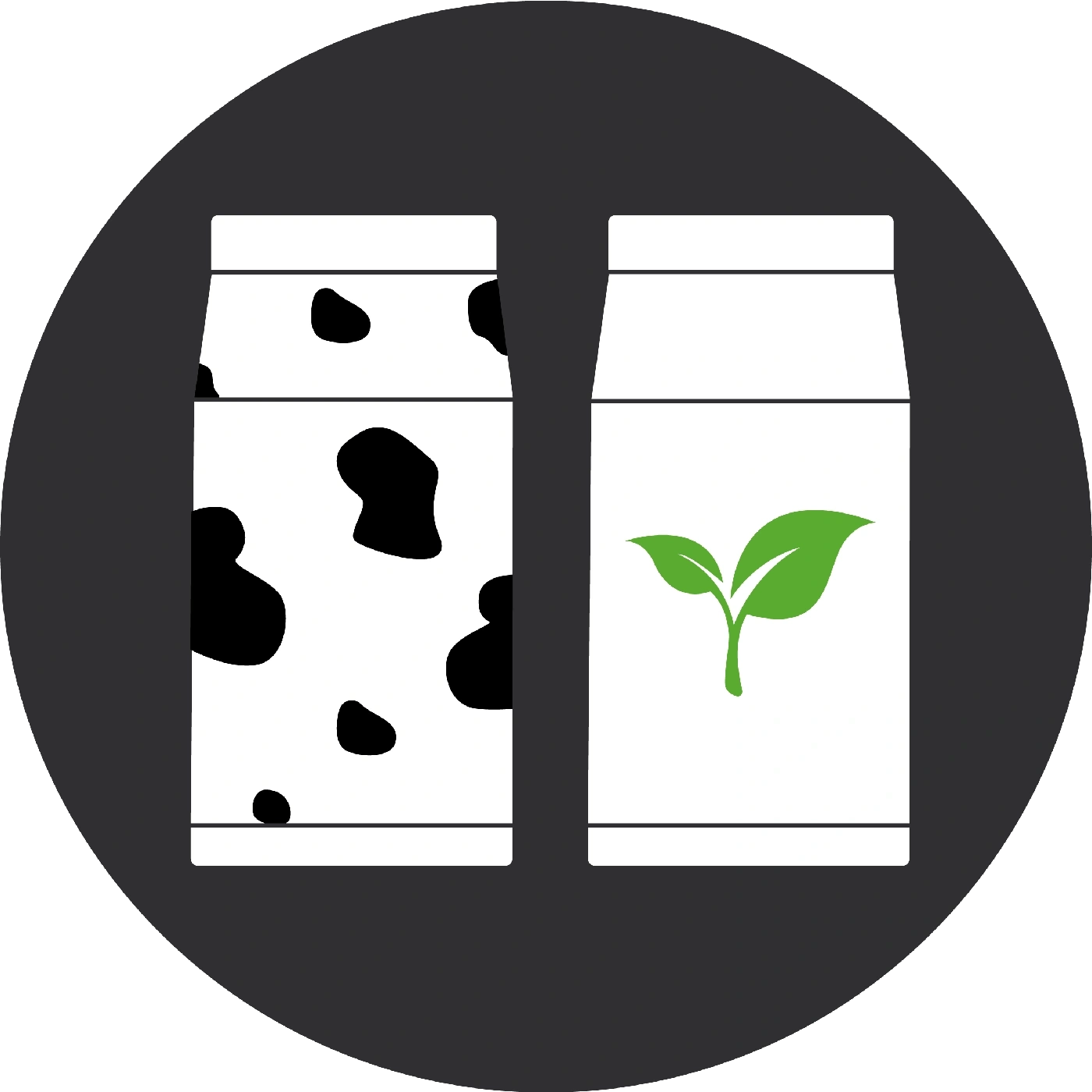 Milk cartons with cow spots and leaves on a gray background