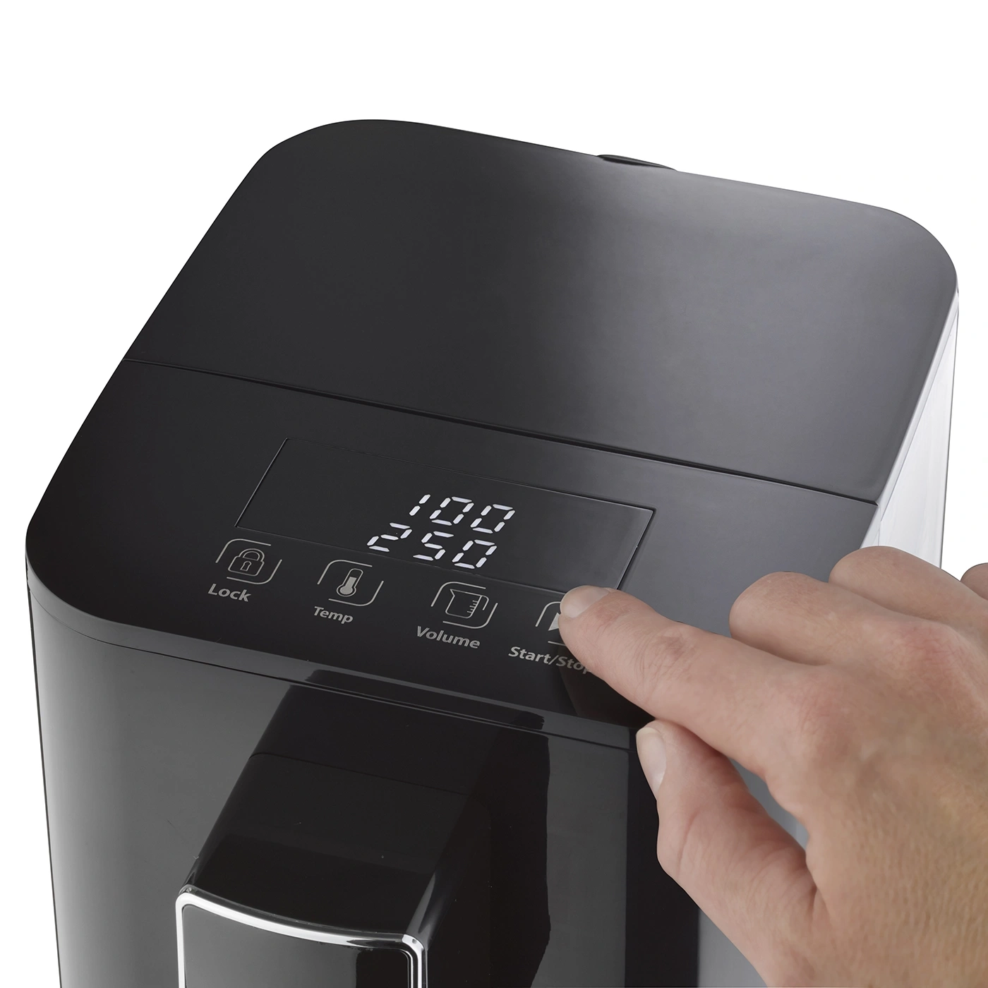 Black air fryer with control panel and hand pressing a button to start.