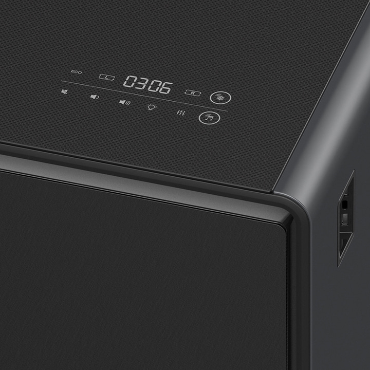 Black device with display and buttons, detail shot, close-up, modern design